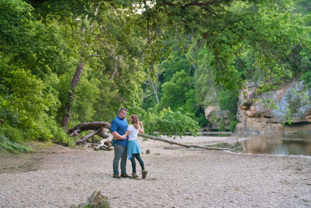 Couple shares a dance on the shore of Sugar Creek at Turkey Run State Park in Indiana.