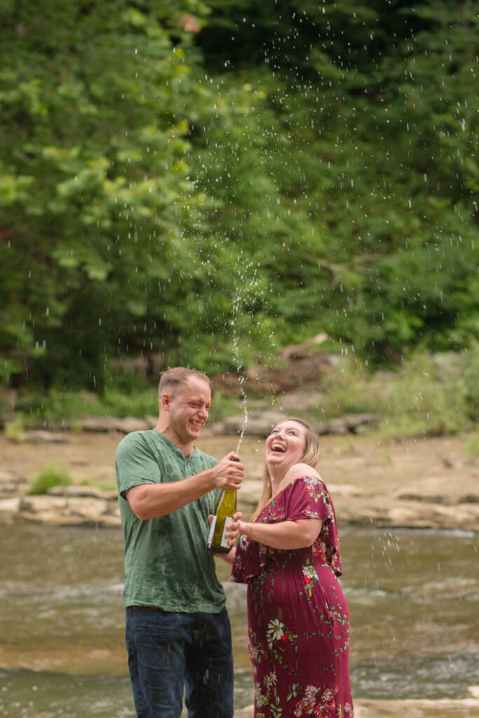 Couple pops sparkling water to celebrate engagement.