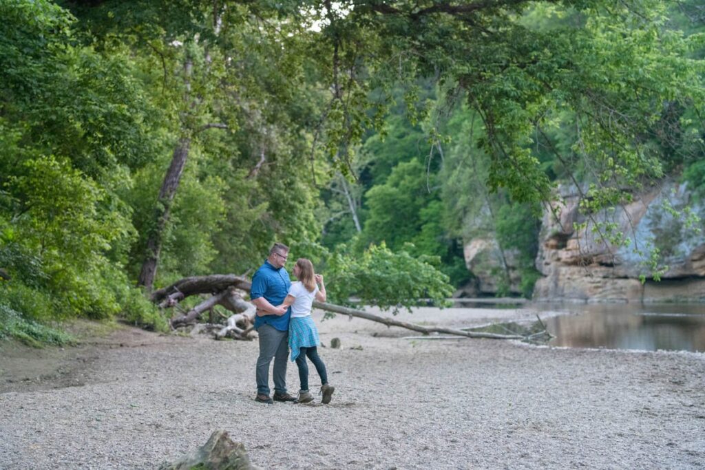 Couple dances next to creek at Turkey Run State Park in Indiana.