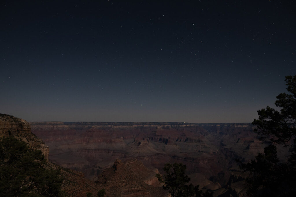 Stars shine over the Grand Canyon.
