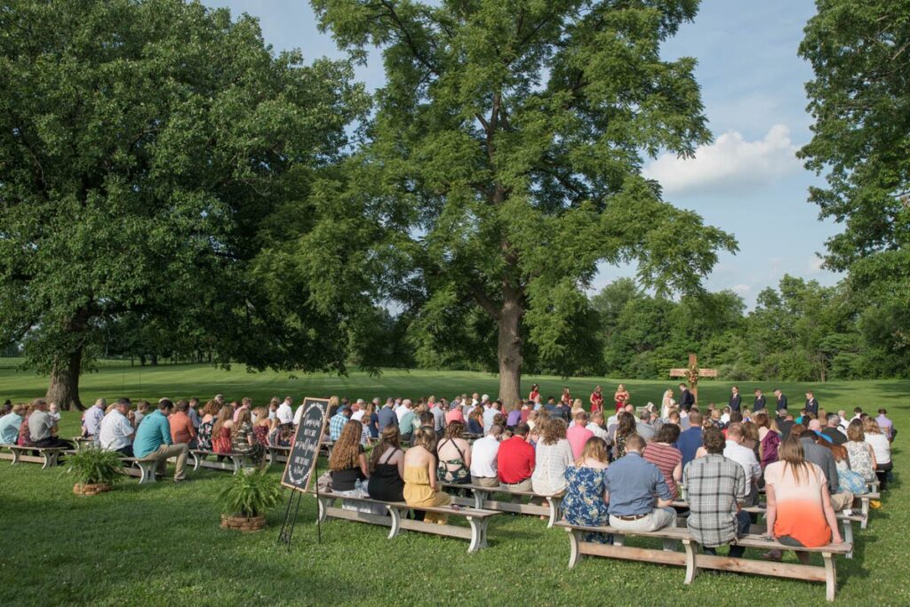 Kennedy Estate wedding outdoor ceremony with guests present.