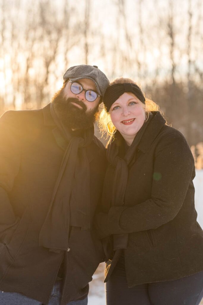 This sunset photoshoot in the snow has this couple smiling.