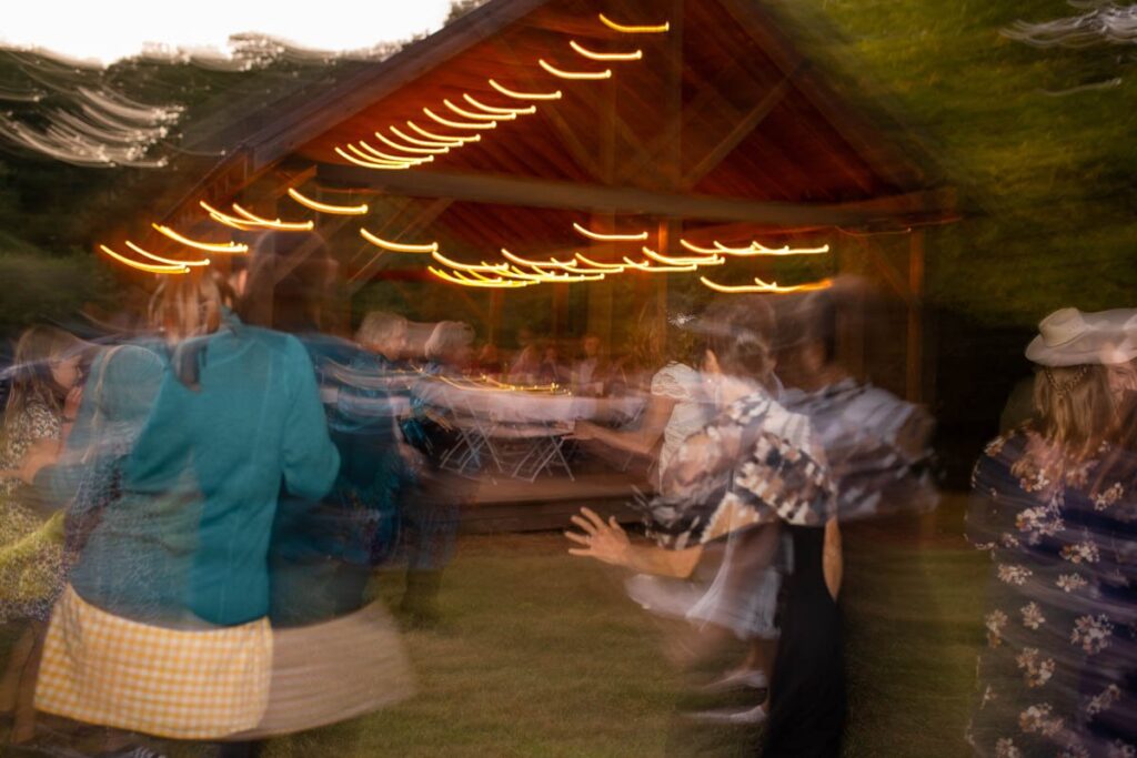 Blurred dancing at wedding reception.
