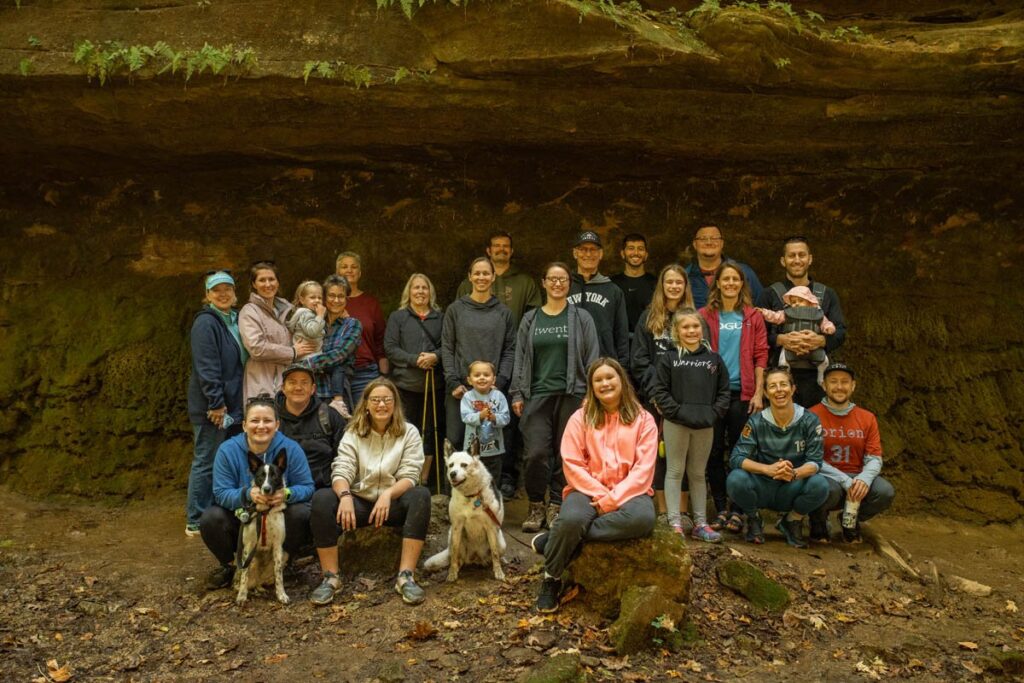 Large group of hikers standing together smiling at Shades State Park.