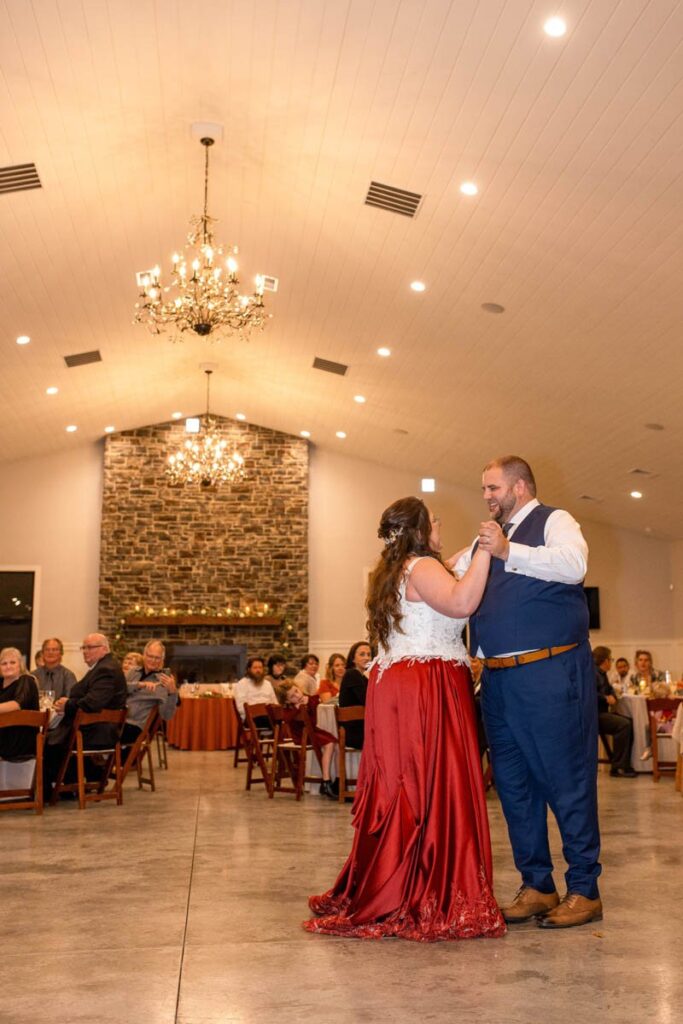 Bride and groom share their first dance together at their Owl Ridge wedding.