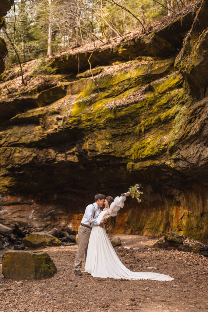 Couple celebrate with a dip after their Indiana elopement.