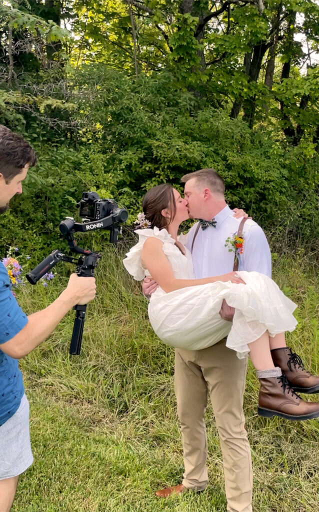 Wedding photo and video team capturing a couple kissing on their elopement day.