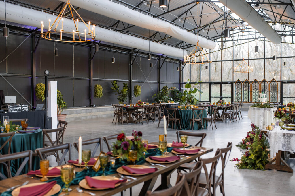 Greenhouse styled wedding venue decorated for winter solstice wedding reception.