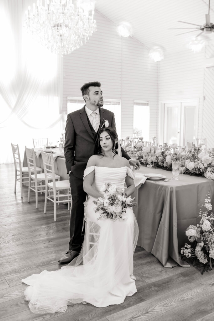 Bride and groom in indoor reception space