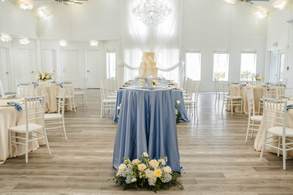 Cake sits on a table inside reception space.