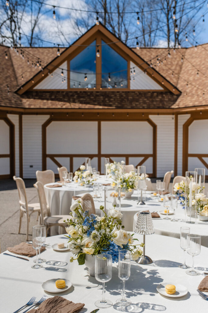 Outdoor reception space with twinkle lights at Lizton Lodge Wedding Venue.